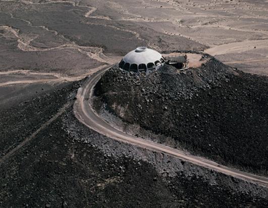 dinosaur volcano house